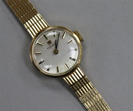 A ladys 9ct Tissot manual wind wrist watch.